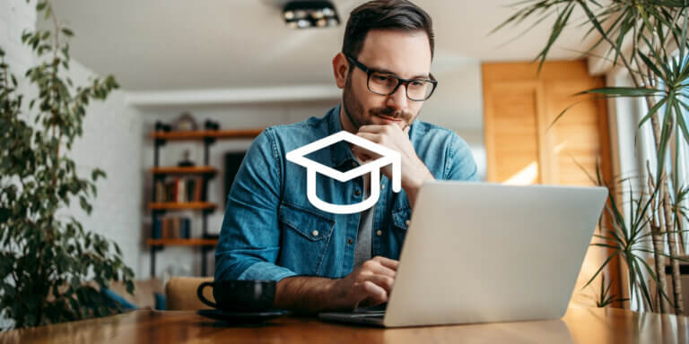 A visual showing a man working on his laptop and a graduation hat icon featured in the middle.